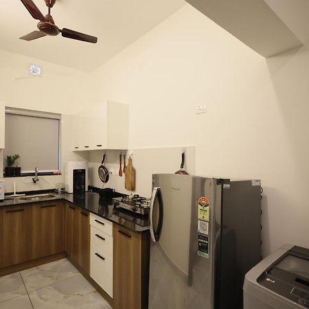 Indigo Springs Appartement Thiruvananthapuram Buitenkant foto