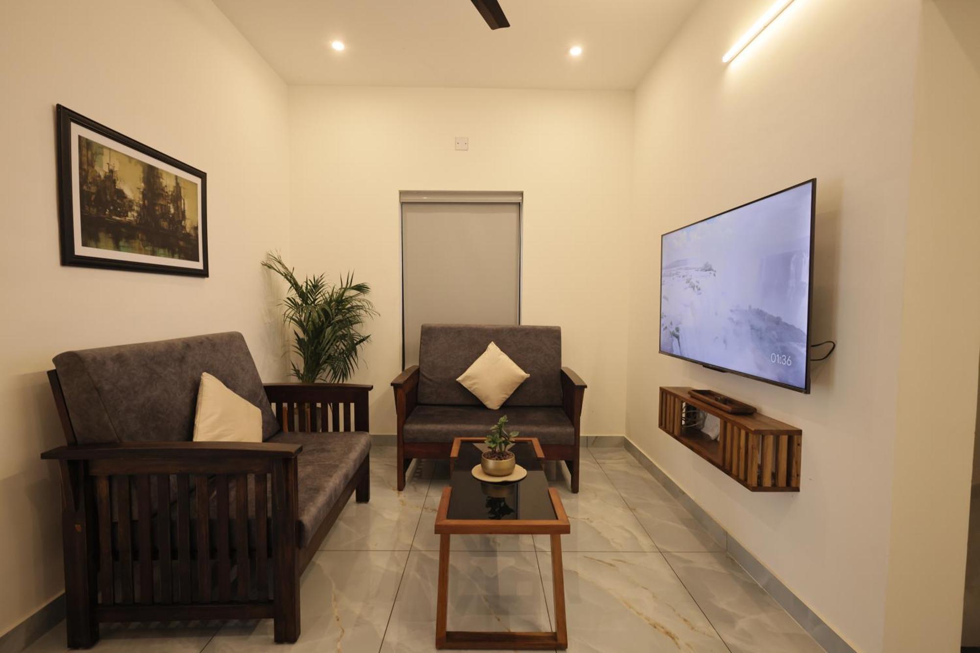 Indigo Springs Appartement Thiruvananthapuram Buitenkant foto